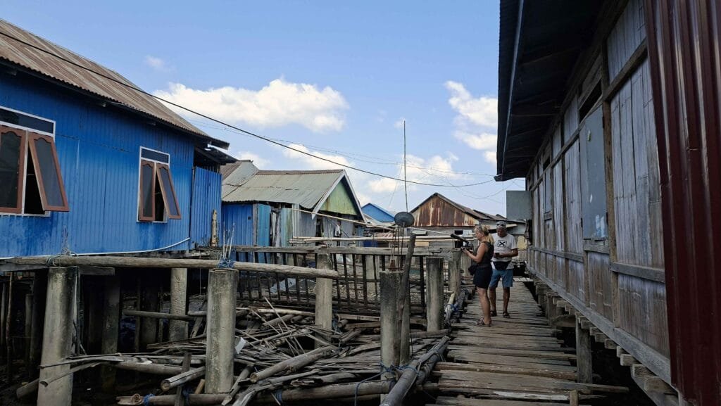 Wooden walkways connecting traditional houses in Wuring Fishing Village, Maumere
